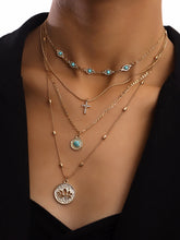 Layered Gold Tone Necklace with Turquoise and Charms