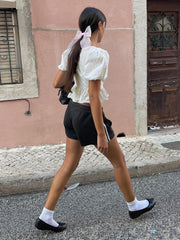 Semi-Sheer Keyhole Neckline Tie-Front Peplum Top